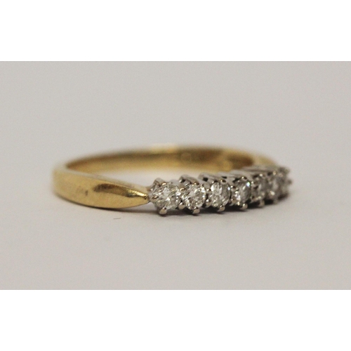 532 - 18ct gold half hoop diamond ring set with a quarter of a carat of diamonds, ring size L, 2.8gms