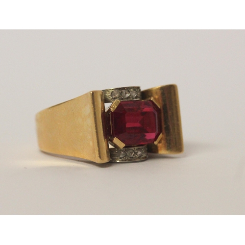 537 - 1940's Odeonesque ruby and diamond dress ring set in 18ct yellow gold, ring size P, 12.4gms