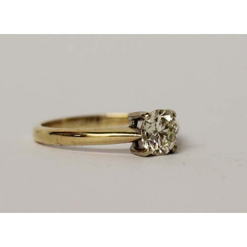 540 - A diamond solitaire ring, in a claw setting, diamond weighs 1.01 cts, hallmarked 18ct yellow gold ba... 