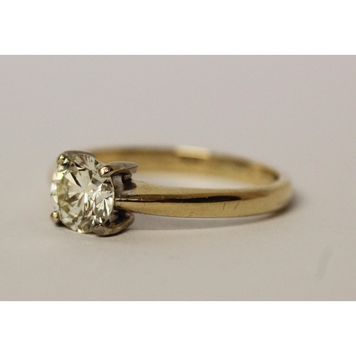 540 - A diamond solitaire ring, in a claw setting, diamond weighs 1.01 cts, hallmarked 18ct yellow gold ba... 