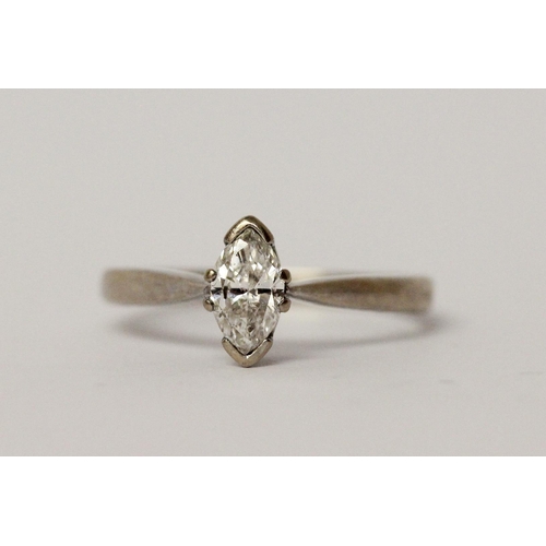 545 - Modern diamond engagement ring, set with a marquise diamond weighing approximately 60 pts, hallmarke... 