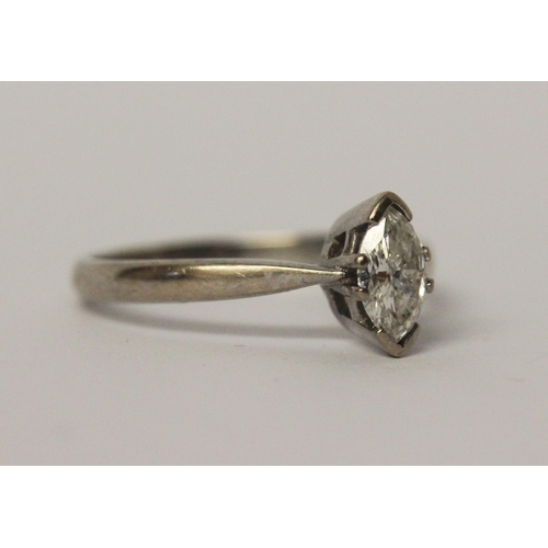 545 - Modern diamond engagement ring, set with a marquise diamond weighing approximately 60 pts, hallmarke... 