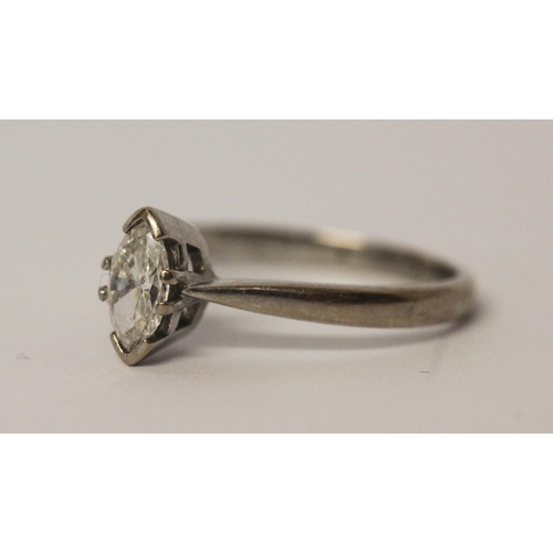 545 - Modern diamond engagement ring, set with a marquise diamond weighing approximately 60 pts, hallmarke... 