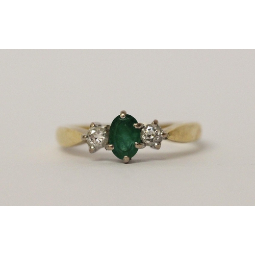 546 - Emerald and diamond three stone ring, hallmarked yellow gold band, ring size P, 3.5gms