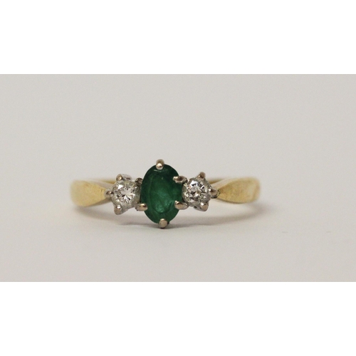 546 - Emerald and diamond three stone ring, hallmarked yellow gold band, ring size P, 3.5gms