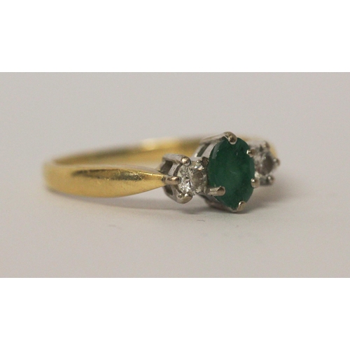 546 - Emerald and diamond three stone ring, hallmarked yellow gold band, ring size P, 3.5gms