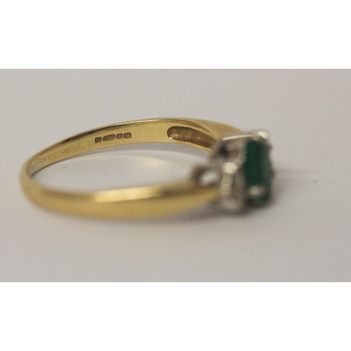 546 - Emerald and diamond three stone ring, hallmarked yellow gold band, ring size P, 3.5gms