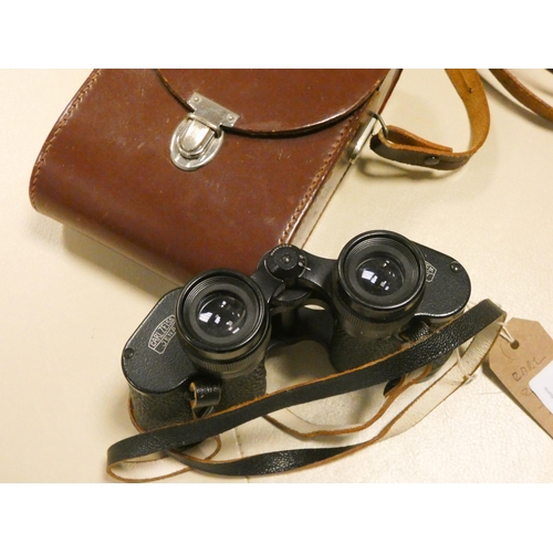 564 - A pair of Carl Zeiss 80 x 30 binoculars with brown leather case