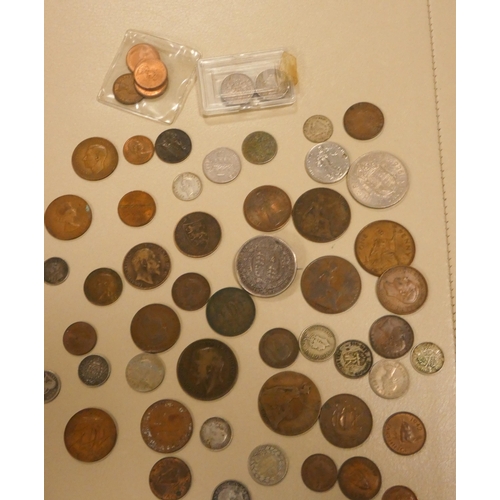 580 - A small collection of English and other foreign coins