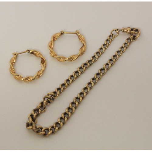 549 - A pair of 9ct yellow gold hoop earrings, and a 9ct gold curb link bracelet 6.8 grams together with 1... 