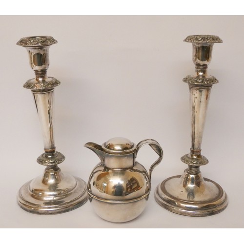 584 - A Walker & Hall silver plated three piece tea set, together with tray, pair of candlesticks and a wa... 