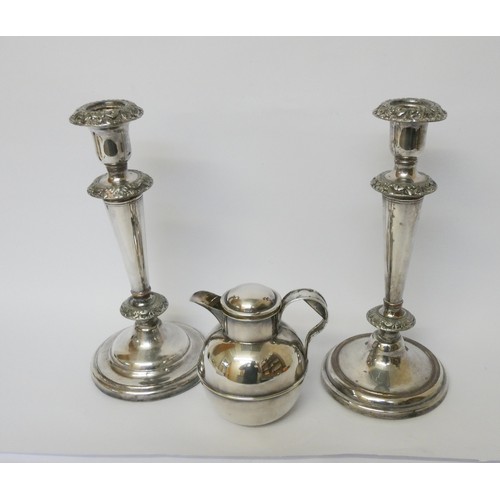 584 - A Walker & Hall silver plated three piece tea set, together with tray, pair of candlesticks and a wa... 