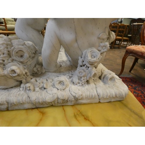 358 - A Victorian marble figure group of three cherubs playing on a square naturalistically carved base, 2... 