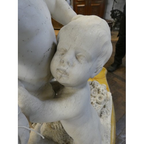 358 - A Victorian marble figure group of three cherubs playing on a square naturalistically carved base, 2... 