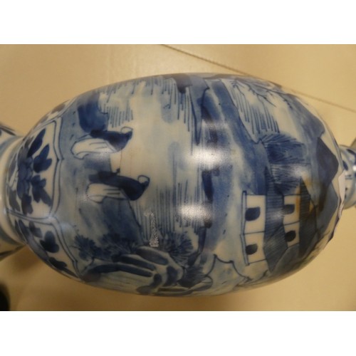 166 - A Chinese blue and white vase decorated with a landscape scene, Art leaf to base. 28cms tall