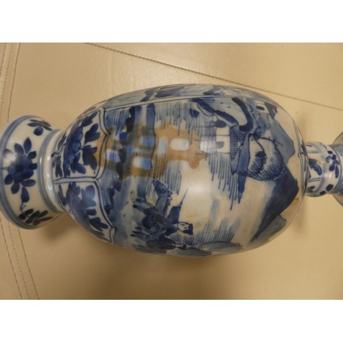 166 - A Chinese blue and white vase decorated with a landscape scene, Art leaf to base. 28cms tall