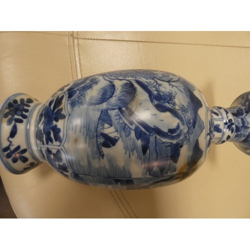 166 - A Chinese blue and white vase decorated with a landscape scene, Art leaf to base. 28cms tall