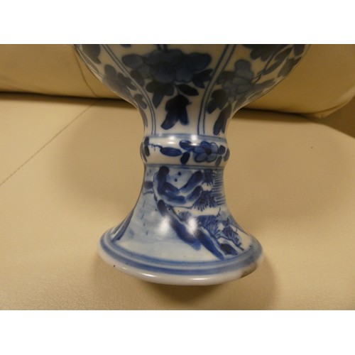 166 - A Chinese blue and white vase decorated with a landscape scene, Art leaf to base. 28cms tall