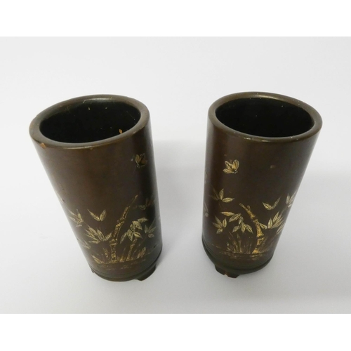 202 - A pair of Chinese lacquered bamboo brush pots decorated with gilded bamboo