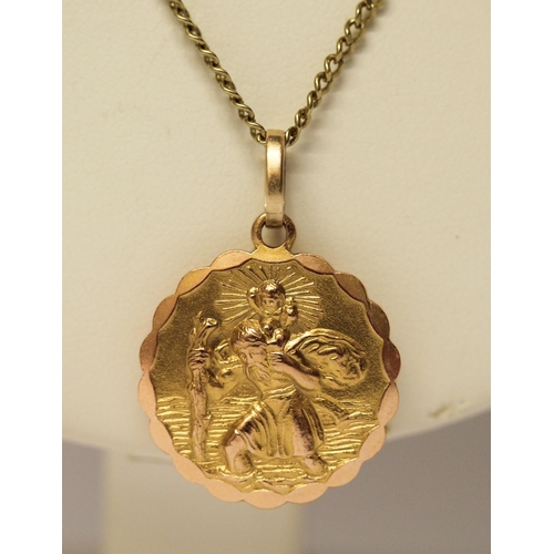 516 - 9ct yellow gold chain necklace, 64cms long, with 9ct gold St Christopher attached, 13.4gms