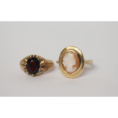 519 - 9ct gold garnet signet style ring size J and a 9ct gold cameo set ring size O