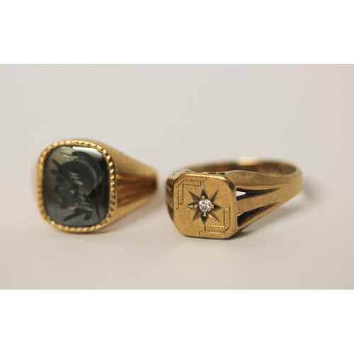 523 - A 9ct gold signet ring set with a diamond, size Q and another 9ct yellow gold onyx panel signet ring... 