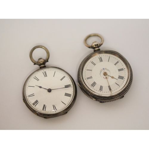 539 - Two Victorian silver open faced fob watches, both with engraved back covers.