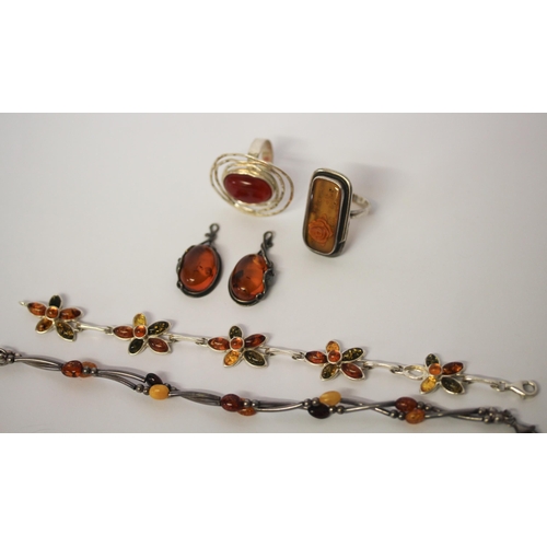 554 - A selection of silver and Baltic amber jewellery