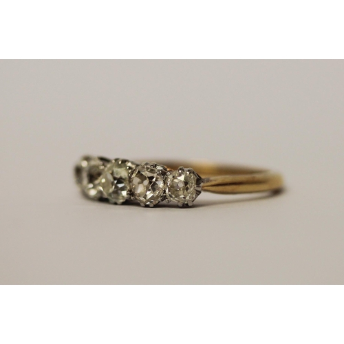 571 - A Victorian five stone diamond ring, with five graduated old cut diamonds in claw setting, 18ct yell... 