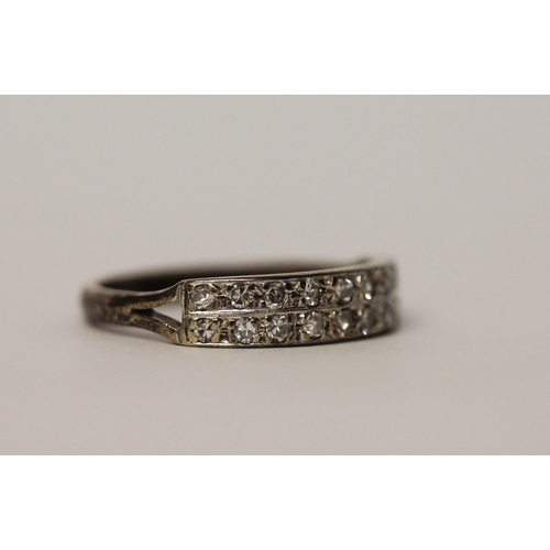 577 - A diamond band ring, set with two rows of brilliant cut diamonds on 9ct gold band, ring size P, weig... 