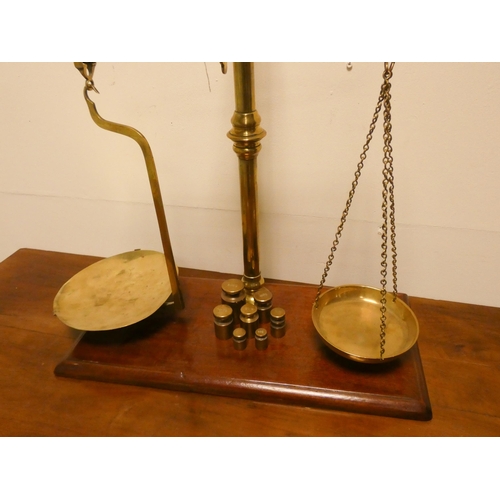 193 - A pair of brass balance scales with weights