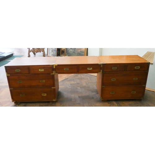 195 - A long military mahogany and brass bound campaign desk in three sections comprising two chest of dra... 