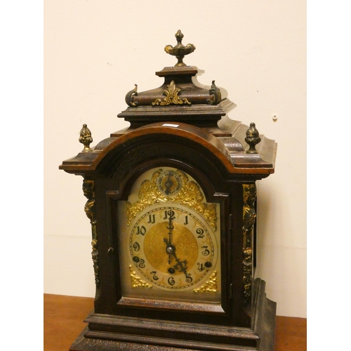 355 - A 19th century chiming and striking bracket clock in decorative mahogany case with arched brass and ... 