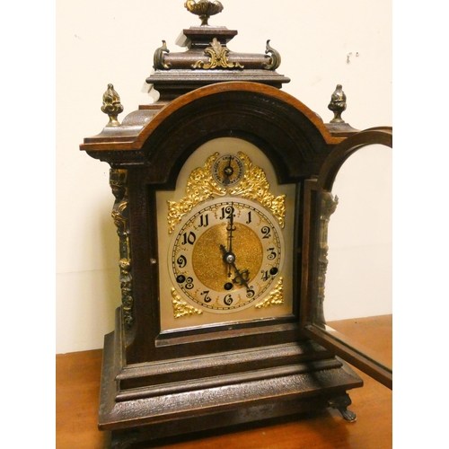 355 - A 19th century chiming and striking bracket clock in decorative mahogany case with arched brass and ... 