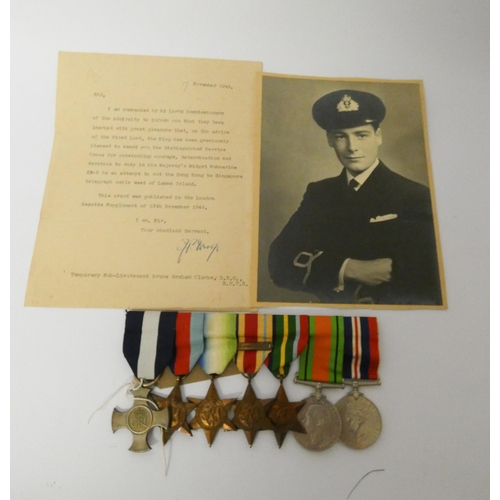 221 - A group of seven WWII medals with accompanying miniatures to Lieutenant Bruce Graham Clark DSC of th... 