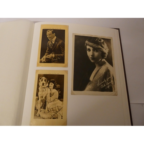 226 - An album containing approximately 35 photographs of American film stars from the stage screen and si... 