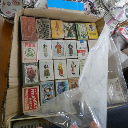 131 - A collection of matchboxes, cigarette packets, tins etc