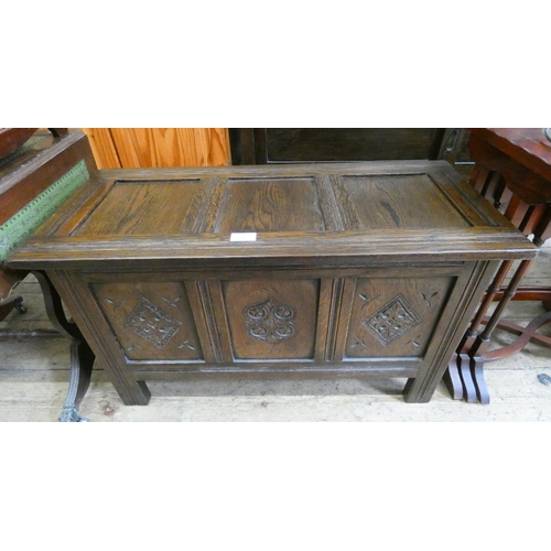 32 - A small reproduction oak three panel coffer, 30