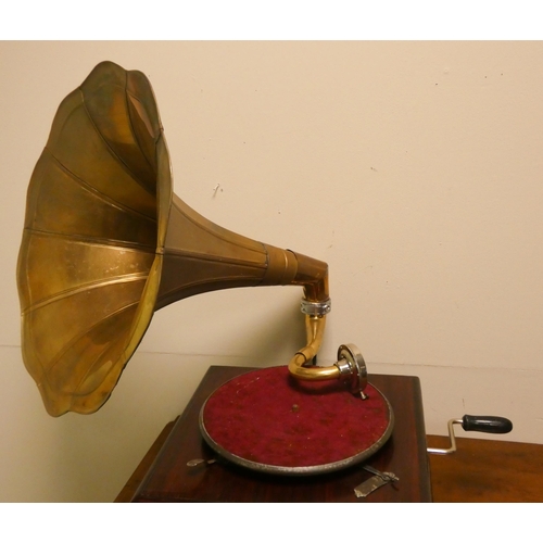 194 - A wind up table model gramophone with large brass horn