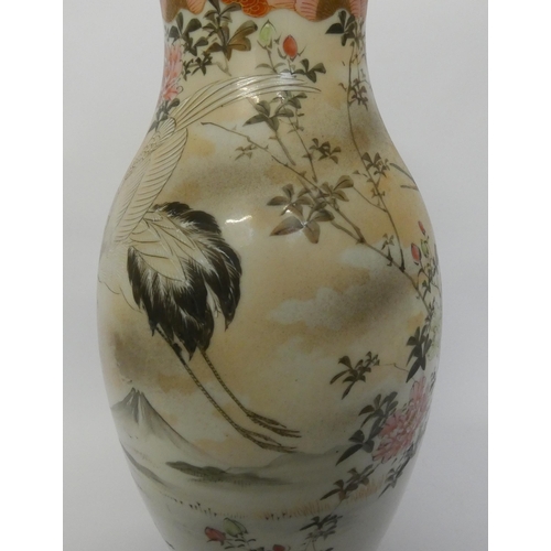 255 - Japanese Satsuma vase decorated with flying cranes within a landscape, character marks to the base, ... 