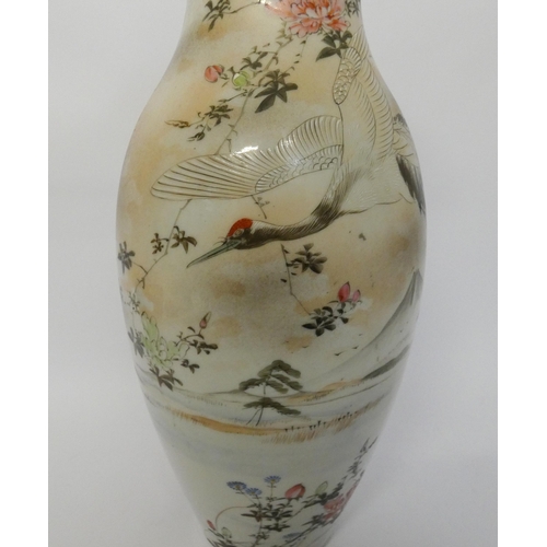 255 - Japanese Satsuma vase decorated with flying cranes within a landscape, character marks to the base, ... 