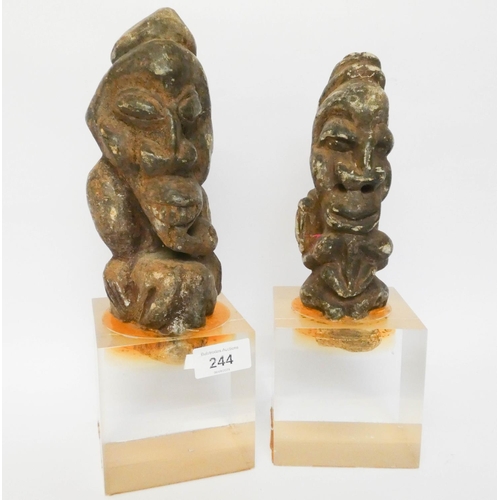 244 - A pair of unusual tribal pottery figures, later mounted on flexi-glass display bases, overall height... 