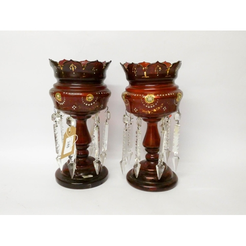 248 - A pair of Victorian ruby glass and enamelled lustres