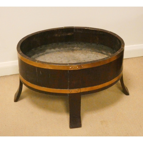 410 - A Georgian style oval mahogany and brass mounted wine cooler, 26