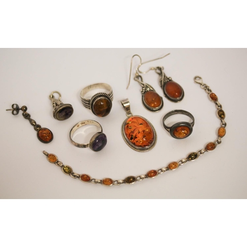 513 - Silver and amber jewellery to include bracelet, dress rings, earrings etc