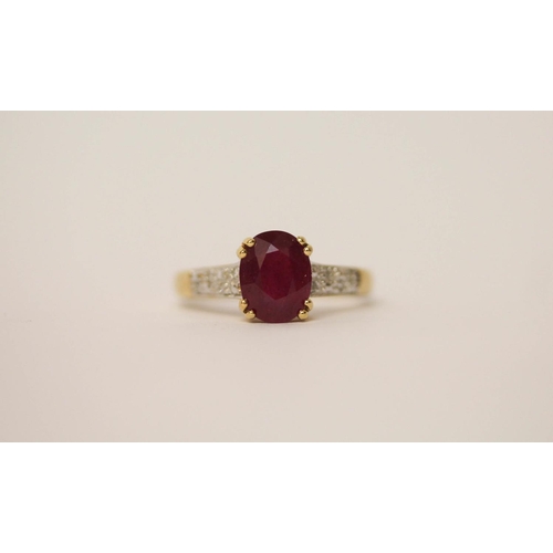 530 - Large oval ruby and diamond dress ring on hallmarked 18ct yellow gold band, ring size N, weight 3.7g... 