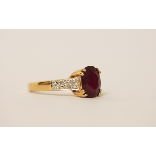 530 - Large oval ruby and diamond dress ring on hallmarked 18ct yellow gold band, ring size N, weight 3.7g... 