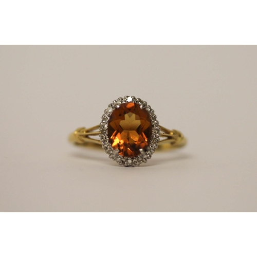 549 - Large oval citrine and diamond cluster ring set in 18ct yellow gold, shank marked 18ct, ring size V,... 