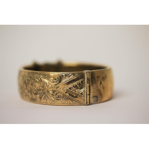 625 - A silver gilt wide hinged bangle