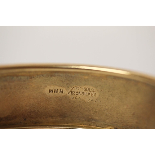 625 - A silver gilt wide hinged bangle